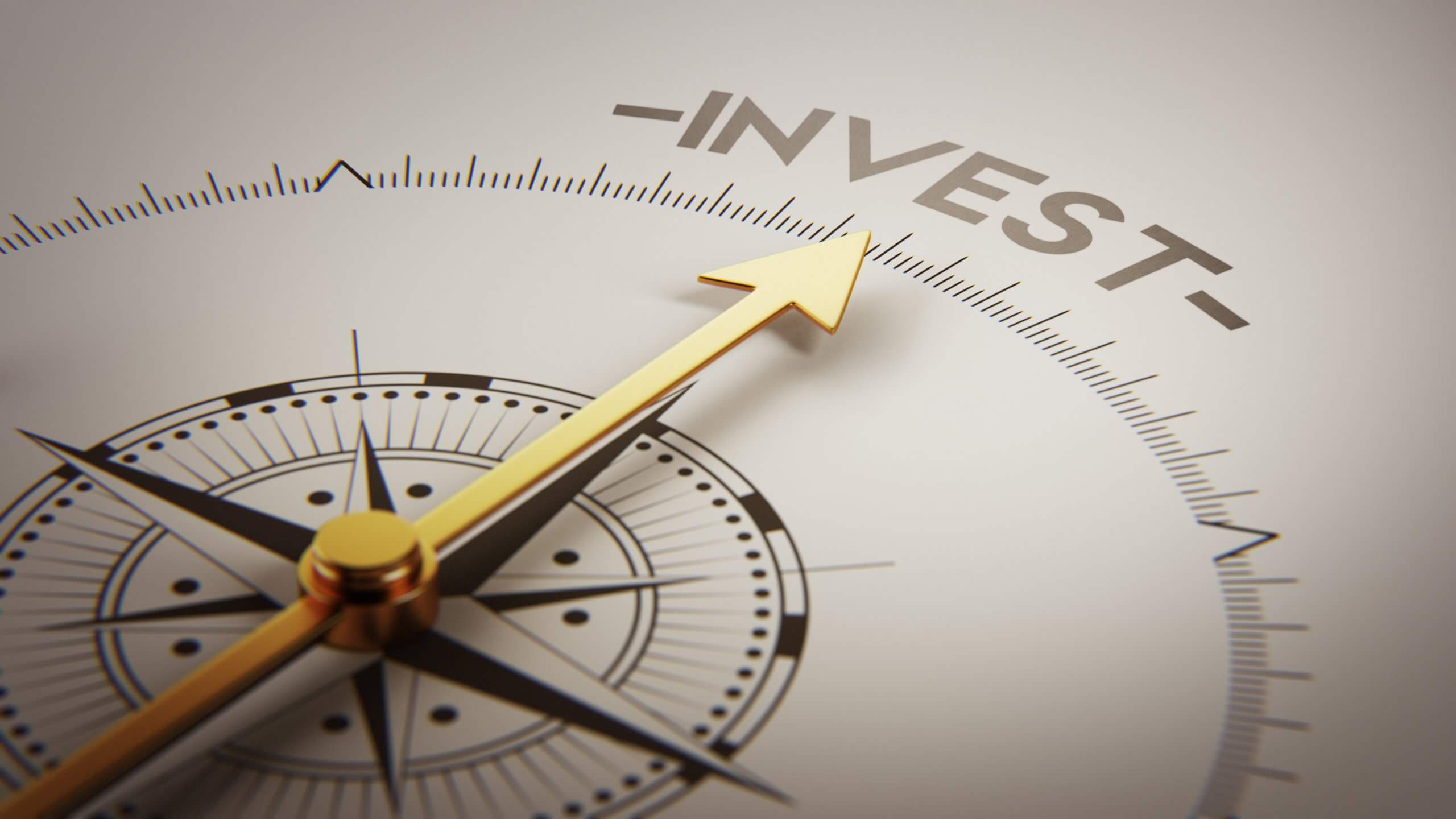 Compass pointing to invest decision